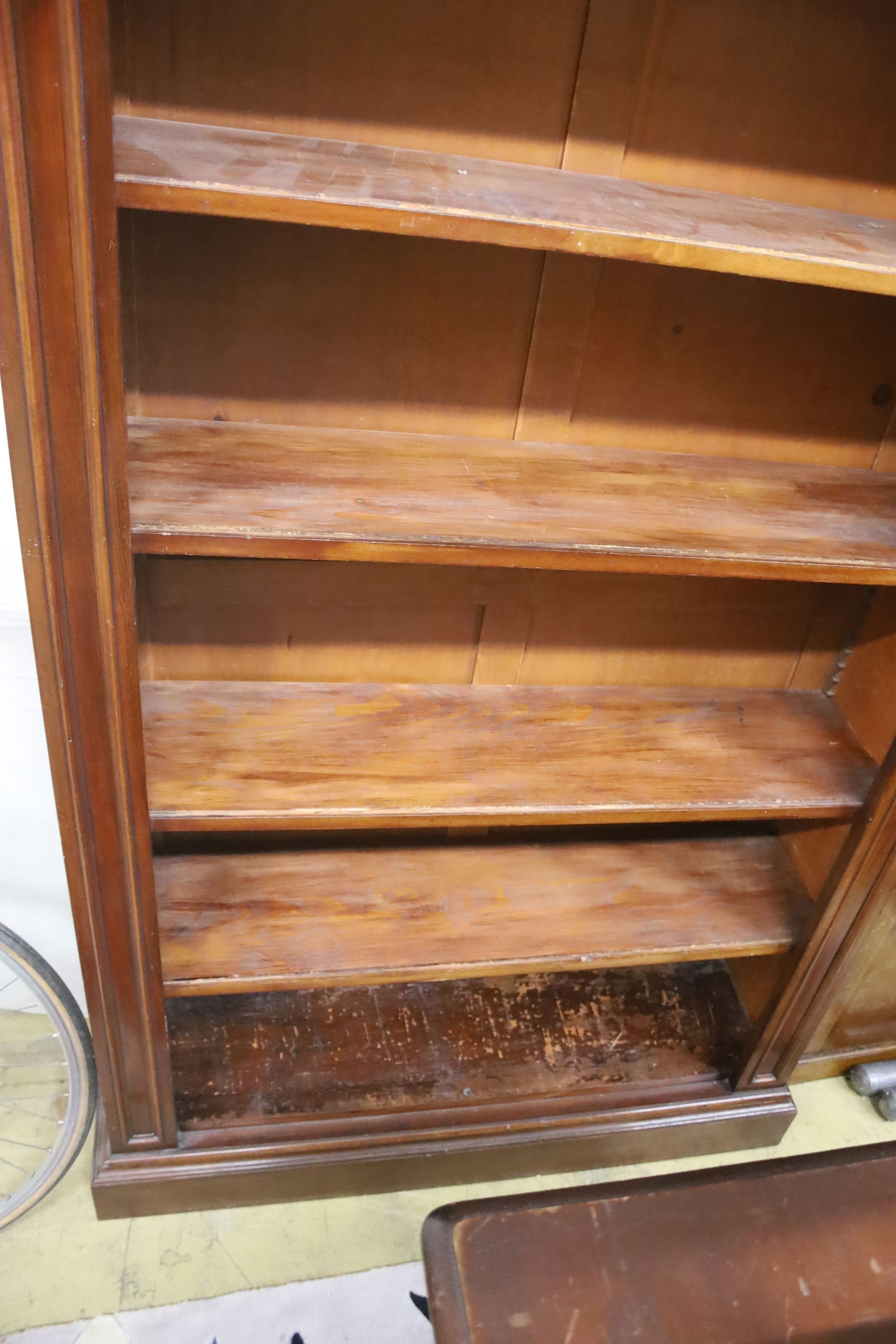 A large late Victorian mahogany open bookcase, length 118cm, depth 36cm, height 187cm